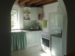 Kuchyňa alebo kuchynka v ubytovaní Eglantine