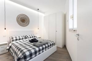 Posteľ alebo postele v izbe v ubytovaní Modern and new flat in Duomo area