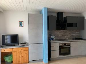 Kuchyňa alebo kuchynka v ubytovaní Ferienwohnung Urisee