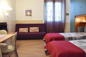 Postel nebo postele na pokoji v ubytování B&B via Roma