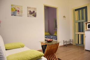 TV a/nebo společenská místnost v ubytování B&B via Roma