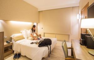 TV a/nebo společenská místnost v ubytování Aparthotel Silver