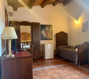 Postel nebo postele na pokoji v ubytování Aranceto Hotel + 37 fotografií