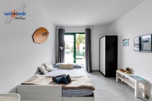 Postel nebo postele na pokoji v ubytování Vivienda Vacacional Buby