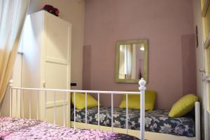 Postel nebo postele na pokoji v ubytování B&B via Roma