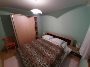 Postel nebo postele na pokoji v ubytování Dražen Apartment