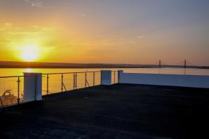Východ nebo západ slunce při pohledu z apartmánu nebo okolí