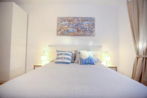Postel nebo postele na pokoji v ubytování Apartamento L&G Centro