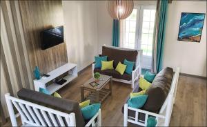 Posezení v ubytování Palmar Beach Villa