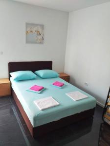 Postel nebo postele na pokoji v ubytování Residence Deja Vu