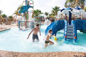 The swimming pool at or close to Three Corners Sea Beach Resort