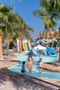 The swimming pool at or close to Three Corners Sea Beach Resort