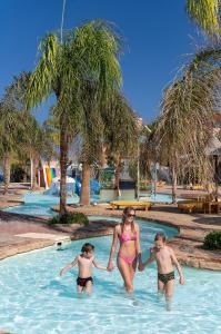 The swimming pool at or close to Three Corners Sea Beach Resort