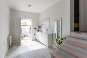 Kuchyňa alebo kuchynka v ubytovaní House Moonstone