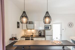 Kuchyňa alebo kuchynka v ubytovaní House Moonstone