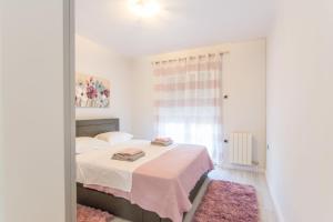 Posteľ alebo postele v izbe v ubytovaní House Moonstone
