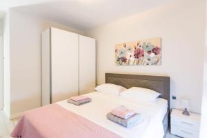 Posteľ alebo postele v izbe v ubytovaní House Moonstone