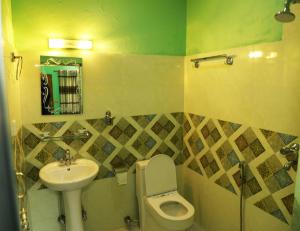 Kylpyhuone majoituspaikassa Hotel Pokhara Paradise