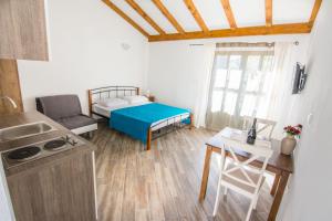 Posteľ alebo postele v izbe v ubytovaní Apartments Tarragon