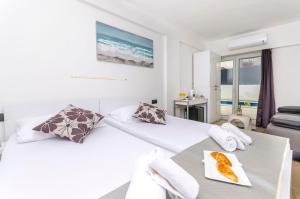 Ένα ή περισσότερα κρεβάτια σε δωμάτιο στο All Saints Suites B&B Kastela +123 φωτογραφίες
