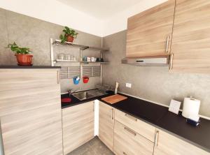 Kuchyň nebo kuchyňský kout v ubytování Tric Trac Hostel