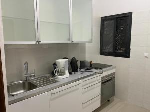 Küche/Küchenzeile in der Unterkunft Residences Fama