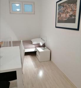 Postel nebo postele na pokoji v ubytování APARTMENT ARIA