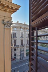 a view of a building from a window at Dimora San Domenico in Palermo