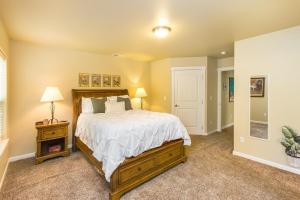 a bedroom with a large bed in a room at Charming Wine Country Retreat! 4 Bedroom 2 Bath in Walla Walla