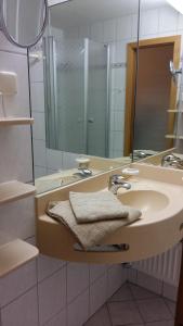 Kupatilo u objektu Herzerl Apartment