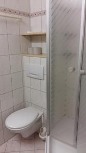 Koupelna v ubytování Herzerl Apartment + 37 fotografií