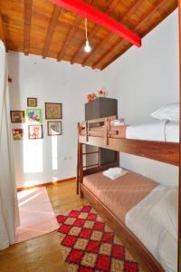 Un pat sau paturi într-o cameră la Archontiko Ilias