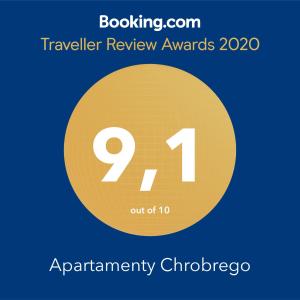 einen gelben Kreis mit den Auszeichnungen für die Reisebewertung in der Unterkunft Apartament Chrobrego 269 in Biała Podlaska