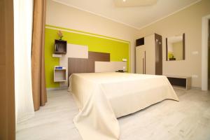 Posteľ alebo postele v izbe v ubytovaní Alisei casa vacanze