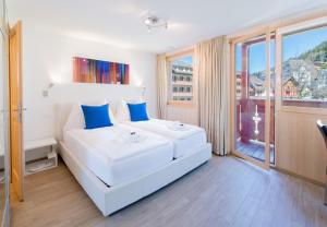 Ένα ή περισσότερα κρεβάτια σε δωμάτιο στο Chalet Belmont