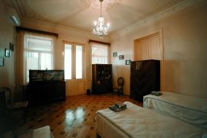 Postel nebo postele na pokoji v ubytování Guest House Old Kutaisi