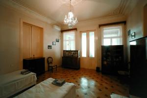 Postel nebo postele na pokoji v ubytování Guest House Old Kutaisi