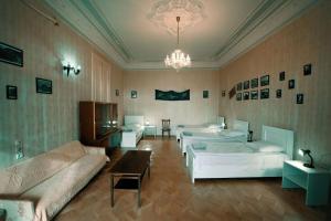 Postel nebo postele na pokoji v ubytování Guest House Old Kutaisi