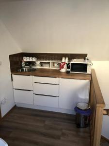 Kuchyňa alebo kuchynka v ubytovaní Apartmán U Kapličky