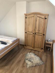 Posteľ alebo postele v izbe v ubytovaní Apartmán U Kapličky
