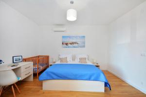 Postel nebo postele na pokoji v ubytování Villa Karaber