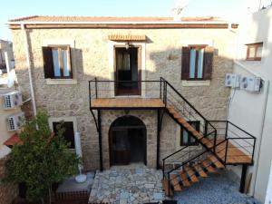 an external view of a building with a staircase at Jasmine Lodge in Famagusta
