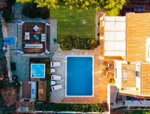 an overhead view of a swimming pool in a yard at Villa Maha - Pool and Jacuzzi, included Breakfast in Korčula