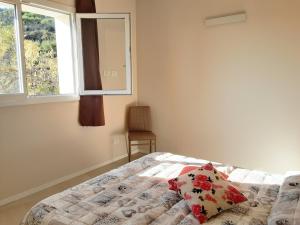 Un pat sau paturi într-o cameră la La VillEtta