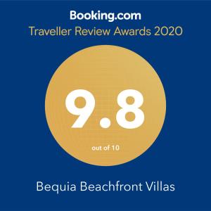 un círculo amarillo con el número ocho y los premios de revisión de texto en Bequia Beachfront Villas, en Friendship