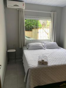 Postel nebo postele na pokoji v ubytování Casa Guarda do Embaú