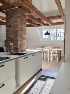 Virtuvė arba virtuvėlė apgyvendinimo įstaigoje Appartment Kornboden Nordic Style