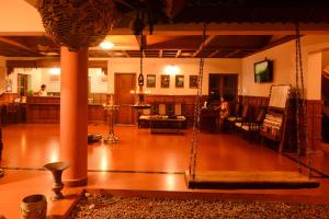 Posezení v ubytování Greenwoods Resort, Thekkady