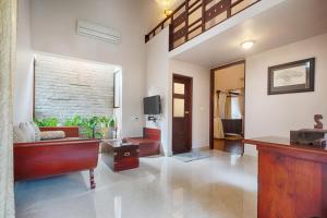 Posezení v ubytování Greenwoods Resort, Thekkady