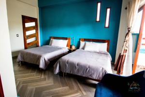 Postel nebo postele na pokoji v ubytování isel magic hotel